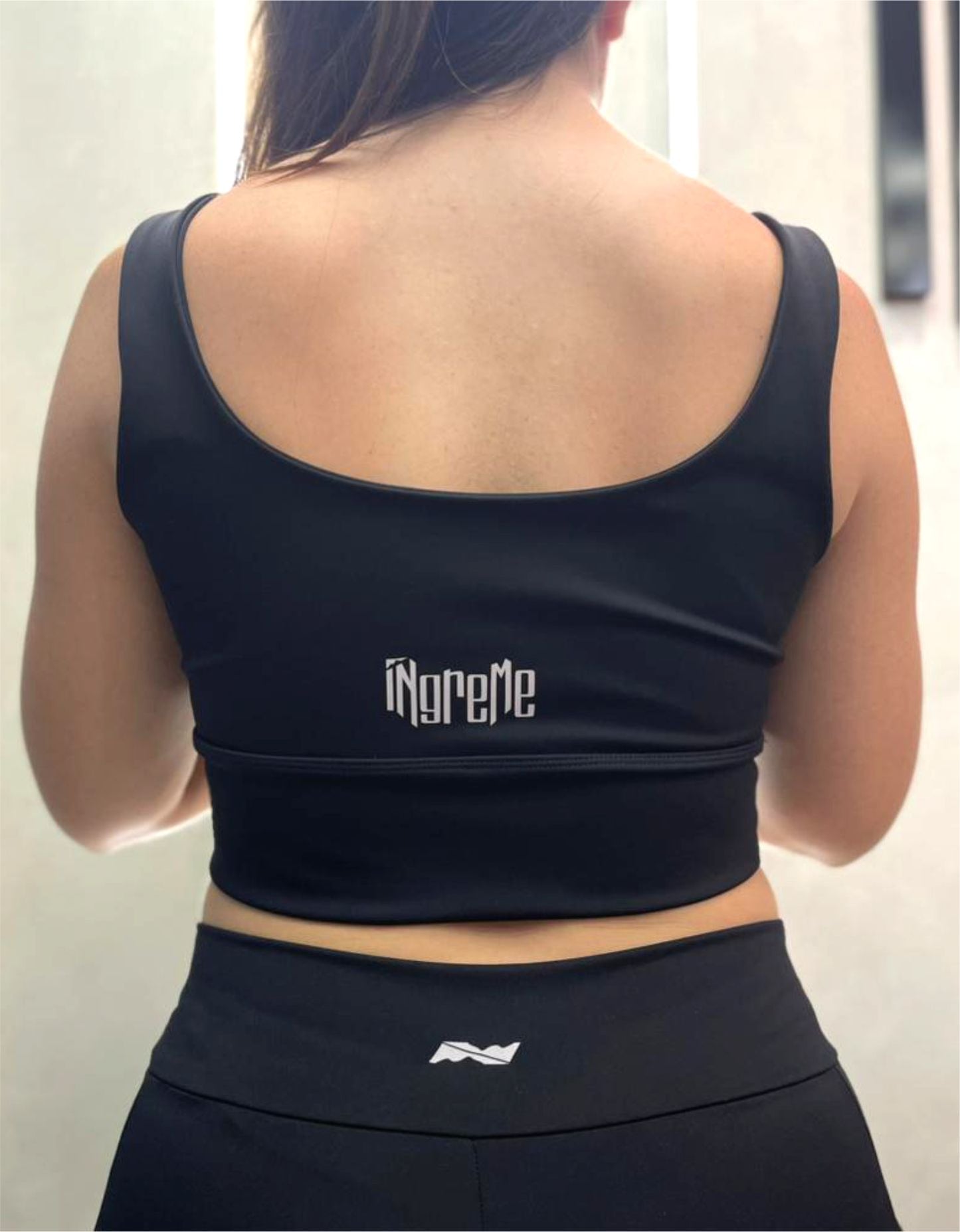 Top com bolso Íngreme